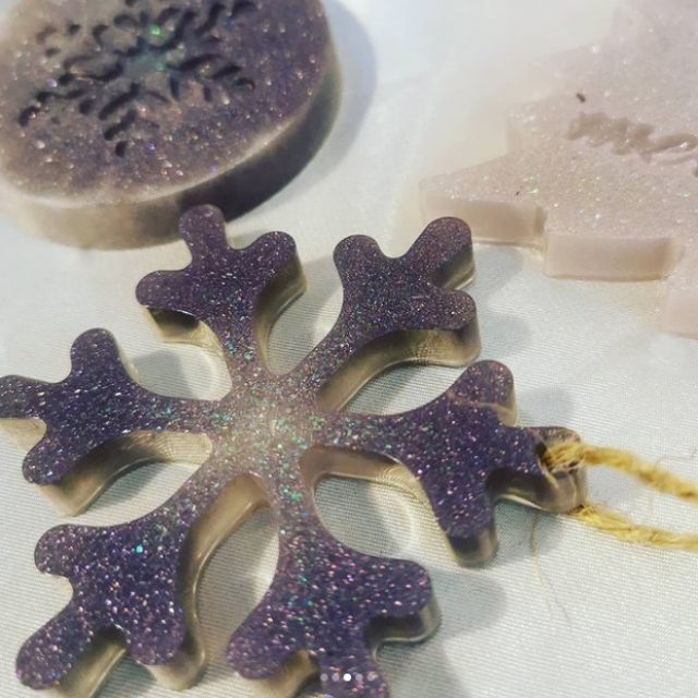 We love the way the intensity of the purple tint increases as it reaches the tips of this epoxy-casted snowflake ornament.